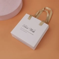 Elegant white square gift bag with gold ribbon handles and Best Wish printed text - White