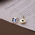 Elegant gold titanium steel studs featuring rectangular deep blue faceted zircon stones - Blue Gold