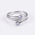 Elegant silver multi-layer spiral ring featuring large cubic zirconia stones on white background - US 6 / Steel