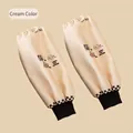 Waterproof cream sleeve covers with checkerboard pattern and elastic ribbed cuffs - Cream (Sleeve Covers - 1 Pair)
