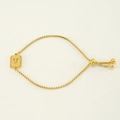 Adjustable golden box chain bracelet featuring a sandblasted square tag with letter V - Letter V / Steel