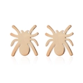 Macro detail of spider earrings in rose gold finish with polished metal texture - Gold