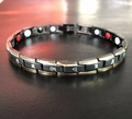 Beveled black and gold titanium steel magnetic bracelet with tricolor therapy magnets - Women's Black Gold Symbols