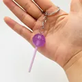 Luminous purple simulation lollipop keychain with translucent acrylic and silver metal ring - Purple