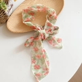 Detailed close-up of a pastoral floral mesh scarf necklace with soft orange flowers - Pink Green (Flower Printed)