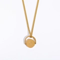 Golden stainless steel oval pendant necklace with a rotatable letter O charm - Letter O