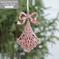 Pink glitter bell Christmas tree ornament with a bow and hollow pattern, size 12x7cm - Wind Chime Style B