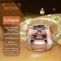 Solar rotating car air freshener in rose gold brown finish with cologne fragrance - Charm Brown Cologne