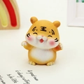 Cute resin tiger car ornament with raised paw and king character on forehead - 2738-6A Lucky Tiger Waving