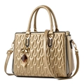 Elegant gold quilted tote bag with wave texture, dual handles and crossbody strap - Gold
