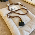 Creative black mini bag pendant necklace with gold metal handle and brown suede cord - Black Bag Style (WN353)