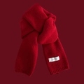 Close-up of thick red knitted scarf texture and white FEIDING label detail - Wine Red (FEIDING Label)