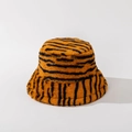 Close-up of tiger print plush bucket hat texture with orange and black faux fur - M (56-58cm) / Orange and Black Tiger Stripe