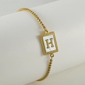 Gold beaded chain bracelet featuring a shell letter H pendant in 18k plated stainless steel - Letter H