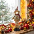 Detailed close-up of a long-legged Christmas teddy bear plush in a festive indoor setting - Telescopic Bear (ML-Q779)
