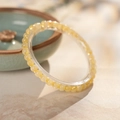 Elegant yellow crystal bead bracelet displayed on a professional ring stand - 33# Bracelet - Yellow (4mm)