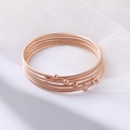 Pulsera de hilo de acero inoxidable en oro rosa con delicadas cuentas de metal - Oro rosa