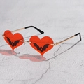 Unique heart shaped bat sunglasses with red lenses and gold metal frame for festivals - Heart Bat Print