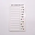 Detail of white RV checklist memo board with 10 sliding task markers on a grey background - RV Checklist Style (RV Checklist Style)