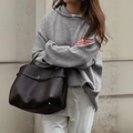Women's casual grey oversized hooded sweater with a dark brown leather tote handbag - S / Gray