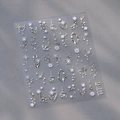 Stickers nail art hiver TL-299 avec flocons blancs et détails d'étoiles dorées gaufrés - TL-299 Style Flocon de Neige / Base Or Zircon Coloré