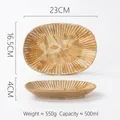 Japanese style oval stoneware salad plate with earthy yellow pattern 23cm x 16.5cm - Dark Brush Stroke Chrysanthemum Plate