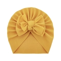 Close-up of bright yellow ribbed baby turban hat with a large decorative bow - Yellow
