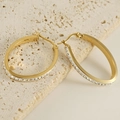 18K vergulde ovale oorringen met sprankelende zirkonia op beige travertijnsteen - 32*45mm / Goud