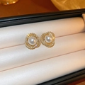 Macro view of vintage gold spiral earrings with zircon crystals and faux pearl center - White Pearl - Real Gold Plated (56# Silver Needle)