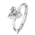 Adjustable silver heart ring featuring a brilliant clear zircon stone on white background - Ring / White Zirconia