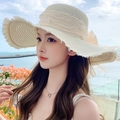 Close-up of summer straw sun hat with delicate lace, pearls and wide brim detail - Large Brim Pearl Creamy White