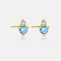Close-up of S925 silver gold-plated stud earrings with blue topaz and zircon stones - December/Sky Blue