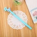 Cute light blue gel pen with a silicone blue giraffe topper and purple spots - Blue Deer