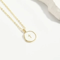 Minimalist gold necklace with a white enamel pendant featuring a tiny golden cross symbol - Cross
