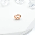 Macro shot of rose gold bead spacer with micro-pave cubic zirconia on white background - 8mm / Rose Gold