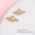 Detailed view of golden heart wing pendants with pink crystals for jewelry making - Angel Wing Heart / Gold Pink Zirconia