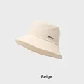 Beige foldable sun bucket hat for women with a silver Narason metal logo plaque - Adjustable (54-58cm) / Beige