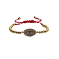 Verstellbares rotes Armband mit Goldperlen und Evil Eye Anhänger mit blauen Kristallen - Kupferperlen Rotes Seil