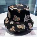 Reversible black cotton bucket hat featuring a trendy streetwear cartoon bear print - Brown Bear (Black)