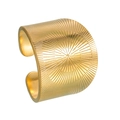 Close-up of gold geometric wide ring with sunburst pattern engraving and open design - Open Design / Gold
