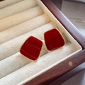 Detailed macro view of red enamel earrings with gold borders in a wooden jewelry box - 27# Silver Earring Post - Gold - Red - Trapezoid