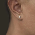 Classic silver four-prong stud earring with round brilliant-cut zircon on male model - 6-Prong Zircon Stud / 6mm Single