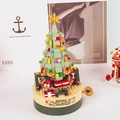Carillon albero di Natale in mattoncini con fiocco d'oro e base rotante festiva - Carillon albero di Natale - Edizione scatola regalo