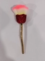 Detail view of rose-shaped makeup brush with red rhinestones and soft gradient pink bristles - Rhinestone Gold Handle Tricolor Bristles
