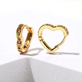 Macro shot of gold heart hoop earrings with colorful pavé zircons on white display - E530-Heart Multicolor / Gold
