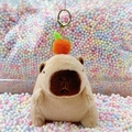 Cute Capybara plush keychain with orange ball decoration and golden metal buckle - Light Brown Orange + Gold Clip