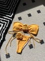 Bright yellow bikini set featuring 3D rose details and adjustable side string ties - Yellow
