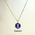 Golden Gemini zodiac necklace with dark blue enamel pendant and sparkling zircons - Gemini
