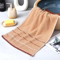 Plush khaki cotton towel featuring decorative three-color stripes on the bottom edge - Cotton Tri-Color Brown (Towel)