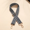 Adjustable wide fabric bag strap featuring black and white striped herringbone pattern - Jacquard Black and White (Gold Buckle)